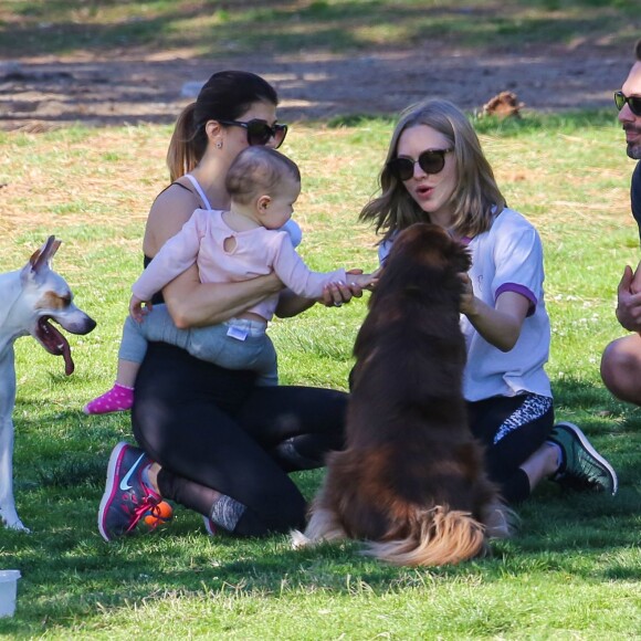 Thomas Sadoski and girlfriend, Amanda Seyfried, were spotted with their dog at the park. They played with the dog on the grass and spent time with a friend and her child. The two looked cute as a button together!, Los Angeles, CA, USA on March 16, 2016. Photo by GSI/ABACAPRESS.COM17/03/2016 - Los Angeles