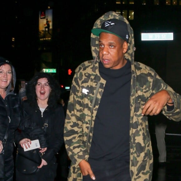 Beyonce Knowles et Jay-Z à la sortie d'une soirée de Noël organisée dans leur bureau à New York, le 14 décembre 2015