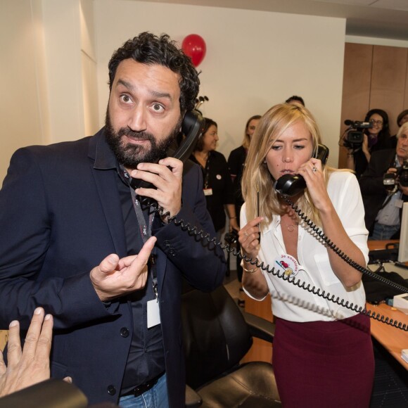 Cyril Hanouna et Enora Malagré - 11e édition du "BGC Charity Day" à Paris le 11 septembre 2015 en mémoire aux 658 collaborateurs du groupe BGC partners (leader mondial du courtage interbancaire) disparus il y a 14 ans dans les attentats du World Trade Center le 11 septembre 2001.