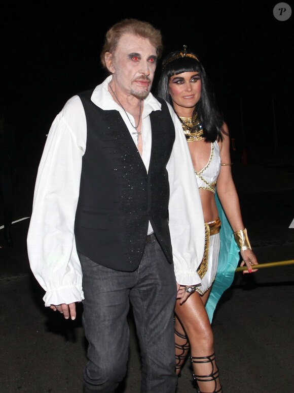 Johnny Hallyday et sa femme Laeticia Hallyday lors de Halloween à Brentwood en 2013