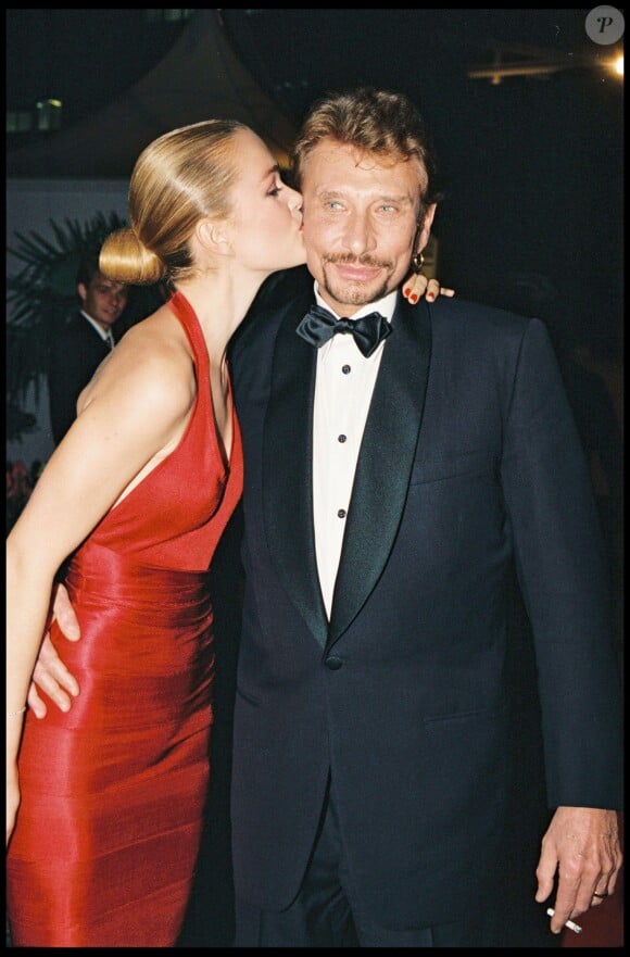 Johnny Hallyday et sa femme Laeticia Hallyday lors du Festival de Cannes en 1998
