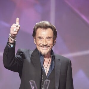 Johnny Hallyday (Victoire Album de chansons "De l'amour") à la Cérémonie des 31ème Victoires de la Musique au Zénith de Paris. Le 12 février 2016