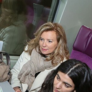 Julien Lauprêtre (président du Secours Populaire) et Valérie Trierweiler au lancement de la campagne "Vacances pour tous 2016" du Secours Populaire à la gare Montparnasse à Paris, le 26 avril 2016