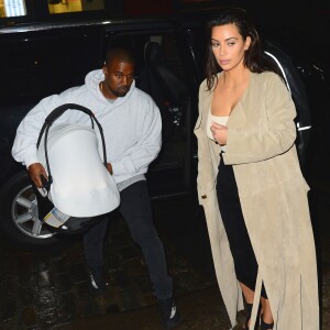 Kanye West, Kim Kardashian et leur fils Saint à New York, le 1er mai 2016.