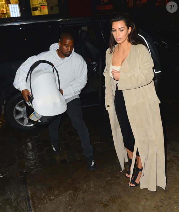 Kanye West, Kim Kardashian et leur fils Saint à New York, le 1er mai 2016.