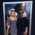 Eddie Murphy et Paige Butcher lors de la première du film "Hercule" à Los Angeles, le 23 juillet 2014
