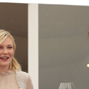 Laszlo Nemes, Kirsten Dunst et Valeria Golino au cocktail des membres du jury du 69ème festival international du film de Cannes à l'hôtel Martinez le 10 mai 2016