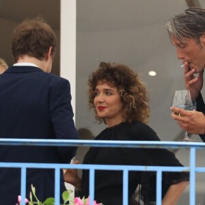 Kirsten Dunst, Laszlo Nemes, Valeria Golino et Mads Mikkelsen au cocktail des membres du jury du 69ème festival international du film de Cannes à l'hôtel Martinez le 10 mai 2016