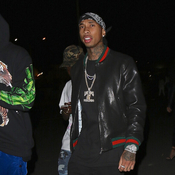 Tyga et deux copines quittent le concert de Beyonce qu'elle a donné dans le cadre de son Formation tour au Rose Bowl de Pasadena à Los Angeles, le 14 mai 2016