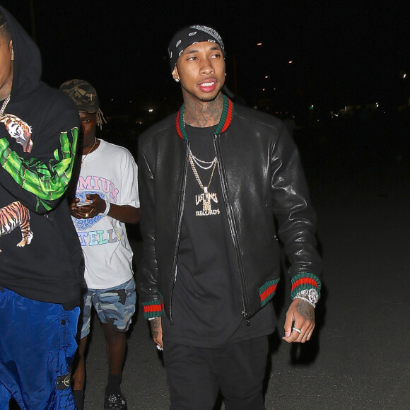 Tyga et deux copines quittent le concert de Beyonce qu'elle a donné dans le cadre de son Formation tour au Rose Bowl de Pasadena à Los Angeles, le 14 mai 2016