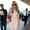 La chanteuse Kesha va prendre un avion à l'aéroport de LAX à Los Angeles, le 15 avril 2016. © CPA/Bestimage