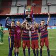 Andrés Iniesta et ses coéquipiers lors de la victoire du Barça (2-0 après prolongations) en finale de la Coupe du Roi face au FC Séville à Vicente Calderon à Madrid en Espagne le 22 mai 2016.