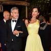 George Clooney et sa femme Amal Alamuddin Clooney (bijoux Cartier) - Descente des marches du film "Money Monster" lors du 69ème Festival International du Film de Cannes. Le 12 mai 2016. © Giancarlo Gorassini/Bestimage