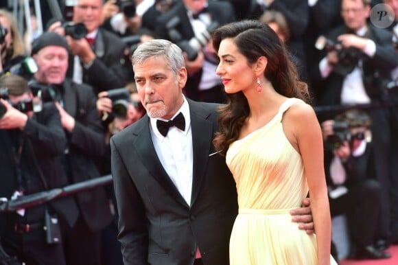George Clooney et sa femme Amal Alamuddin Clooney (bijoux Cartier) - Montée des marches du film "Money Monster" lors du 69ème Festival International du Film de Cannes. Le 12 mai 2016. © Giancarlo Gorassini/Bestimage