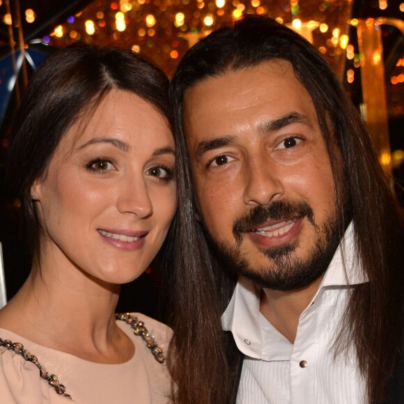 Moundir et sa femme Inès - Personnalités lors de la 10ème cérémonie des Globes de Cristal au Lido à Paris, le 13 avril 2015.