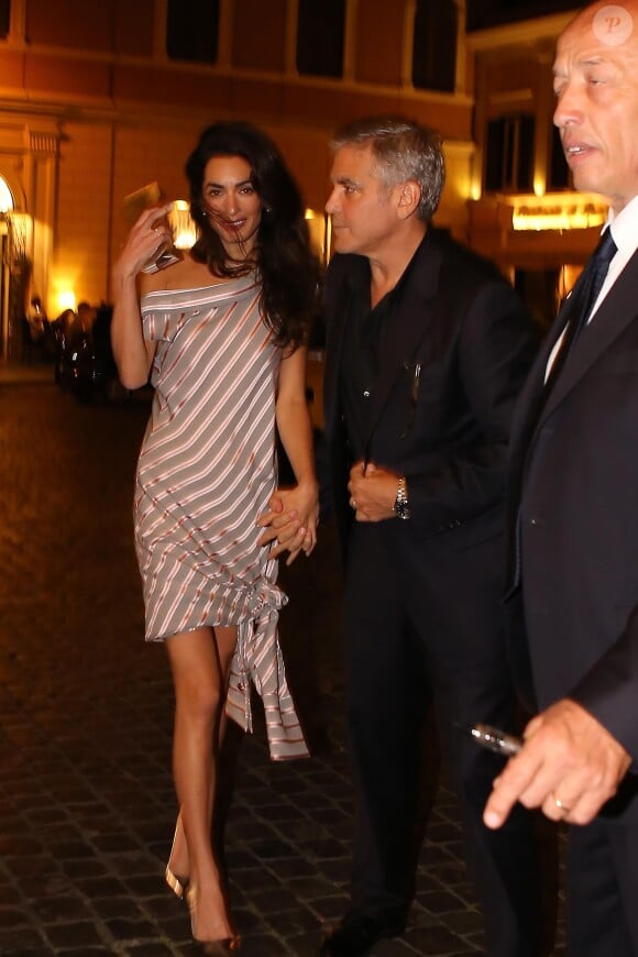 George Clooney et sa femme Amal Alamuddin sont allés diner dans un restaurant à Rome, le 29 mai 201
