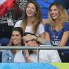 Laury Thilleman et son compagnon Juan Arbelaez (derrière eux, Camille Cerf) tendres lors du match d'ouverture de l'Euro 2016, France-Roumanie, au Stade de France, le 10 juin 2016. © Cyril Moreau/Bestimage