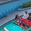 Kim et Kardashian, Kanye West, Scott Disick et leurs enfants North Mason et Penelope à Disneyland. Anaheim, le 15 juin 2016.