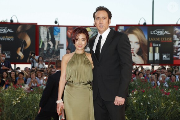 Nicolas Cage et sa femme Alice Kim a la premiere du film " Joe " lors du 70eme festival du film de Venise Le 30 aout 2013