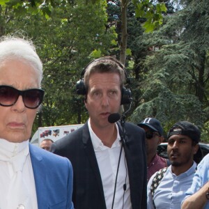 Karl Lagerfeld au défilé Dior Homme prêt-à-porter masculin printemps-été 2017 au Tennis Club de Paris, le 25 juin 2016.