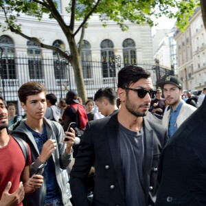 Ricky Martin et son compagnon Jwan Yosef au défilé de mode Balmain Hommes printemps-été 2017 à l'hôtel Potoki à Paris, le 25 juin 2016.