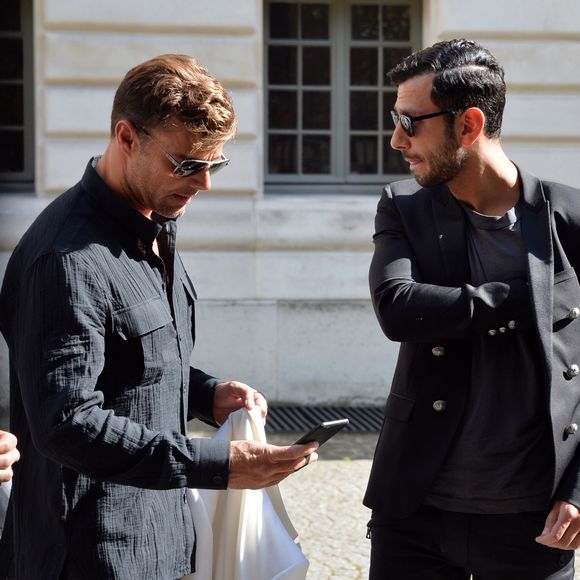 Ricky Martin et son compagnon Jwan Yosef au défilé de mode Balmain Hommes printemps-été 2017 à l'hôtel Potoki à Paris, le 25 juin 2016.