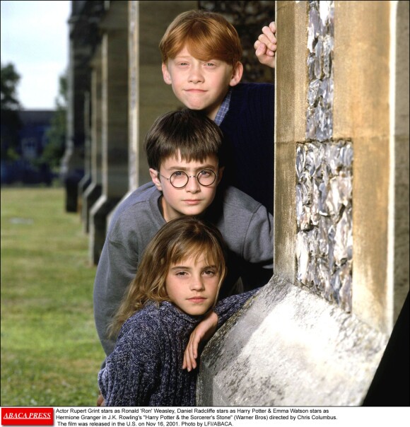 Rupert Grint (Ronald 'Ron' Weasley), Daniel Radcliffe (Harry Potter) & Emma Watson (Hermione Granger) dans Harry Potter & the Sorcerer's Stone en 2001.