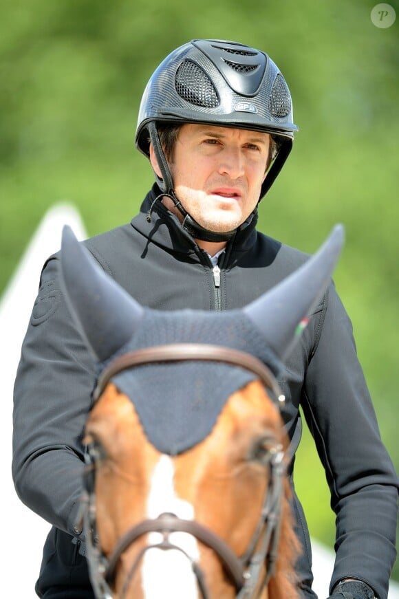 Guillaume Canet sur Pomme du Valon 83 - Détente - Longines Paris Eiffel Jumping au Bois de Boulogne à la plaine de Jeux de Bagatelle à Paris, le 2 juillet 2016. © Pierre Perusseau/Bestimage