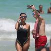 Kourtney Kardashian passe une belle journée ensoleillée avec son fils Mason et son amie Larsa Pippen sur une plage à Miami.  Le 4 juillet 2016
