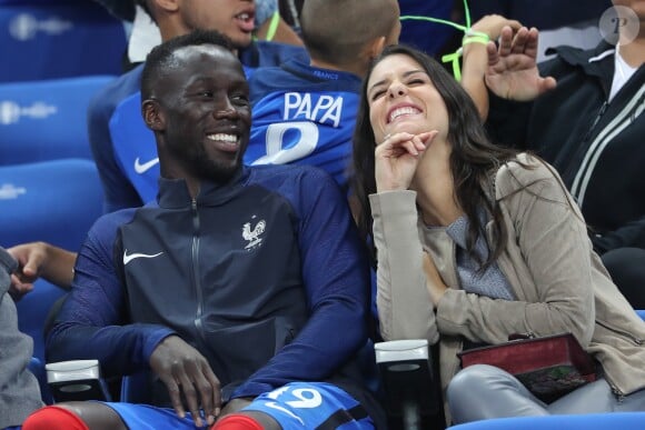 Ludivine et Bacary Sagna - Les joueurs retrouvent leur famille dans les tribunes à la fin du match de quart de finale de l'UEFA Euro 2016 France-Islande au Stade de France à Saint-Denis le 3 juillet 2016. © Cyril Moreau / Bestimage