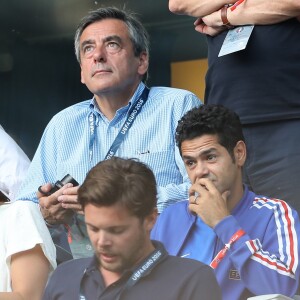 François Fillon, Jamel Debbouze et sa femme Melissa Theuriau - People au match de la finale de l'Euro 2016 Portugal-France au Stade de France à Saint-Denis le 10 juillet 2016. © Cyril Moreau / Bestimage