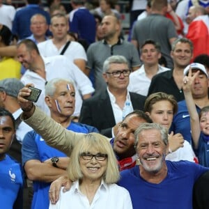 Mireille Darc, Nikos Aliagas et Jean-Claude Darmon - People au match de la finale de l'Euro 2016 Portugal-France au Stade de France à Saint-Denis le 10 juillet 2016. © Cyril Moreau / Bestimage