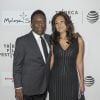 Pelé (Edson Arantes do Nascimento) et sa femme Marcia Aoki assistent à la première du film "Pelé : The birth of a legend" lors du Festival du Film de Tribeca à New York. Le 23 avril 2016
