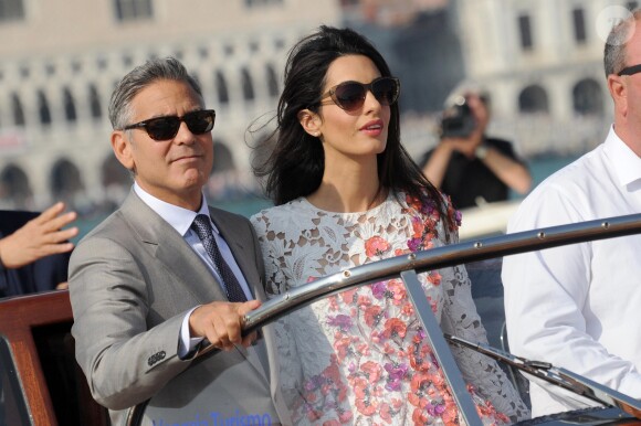 George Clooney et sa femme Amal Alamuddin quittent l'hôtel Aman, où ils ont passé leur nuit de noces à Venise, le 28 septembre 2014