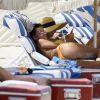 Natasha Oakley, Devin Brugman et Whitney Kaye passent une journée ensoleillée sur la plage de Miami, le 11 juillet 2016.