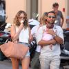 John Legend, Chrissy Teigen et leur fille Luna se promènent à Saint-Tropez. Chrissy porte un débardeur blanc, un short en jean R13, un sa The Row (modèle Market) et des sandales YEEZY (collection SEASON 2). Le 25 juillet 2016.