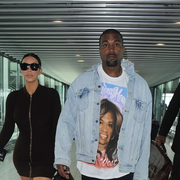 Kim Kardashian et son mari Kanye West arrivent à l'aéroport d'Heathrow à Londres, le 22 mai 2016.