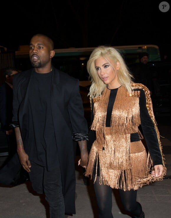 Kim Kardashian et Kanye West lors du dîner Balmain au restaurant Lapérouse à Paris, le 5 mars 2015