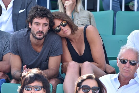 Laure Manaudou et son compagnon Jérémy Frérot (du groupe Fréro Delavega) dans les tribunes lors de la finale des Internationaux de tennis de Roland-Garros à Paris, le 7 juin 2015