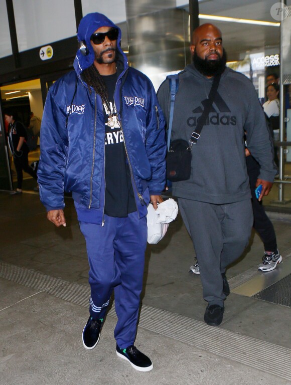 Snoop Dogg à son arrivée à l'aéroport LAX de Los Angeles. Le 22 mai 2016