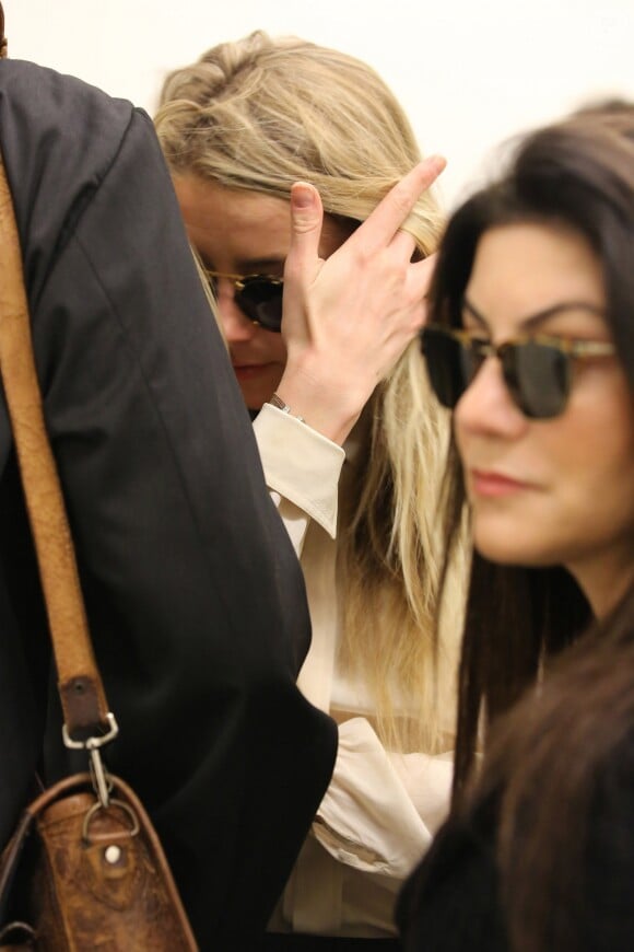 Amber Heard arrive au tribunal de Century City pour faire une déposition dans l'affaire qui l'oppose à son mari Johnny Depp le 6 aout 2016 à Century City.