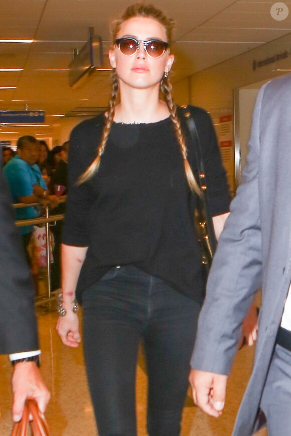 Amber Heard lors de son arrivée à l'aéroport de Los Angeles le 12 août 2016