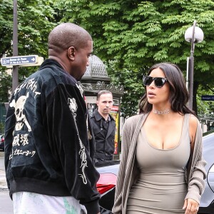 Kim Kardashian et son mari Kanye West arrivent à l'aéroport de Roissy-Charles-de-Gaulle, puis vont déjeuner au restaurant "L'Avenue" à Paris, le 13 juin 2016.