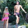 Exclusif - Justin Jedlica, le Ken humain et sa compagne Angelique Morgan sortent de chez de manière très originale à Malibu, le 25 août 2016.