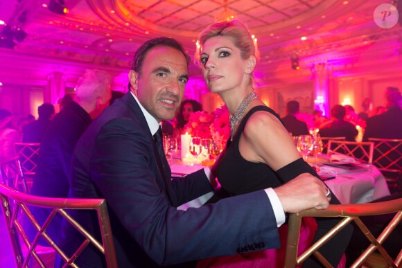 Exclusif - Nikos Aliagas et sa compagne Tina Grigoriou - Dîner du Global Gift Gala au profit de L'Unicef France Frimousses de Créateurs, de The Global Gift Foundation et The Eva Longoria Foundation, organisé au Four Seasons Hôtel George V à Paris, le 25 mai 2015.