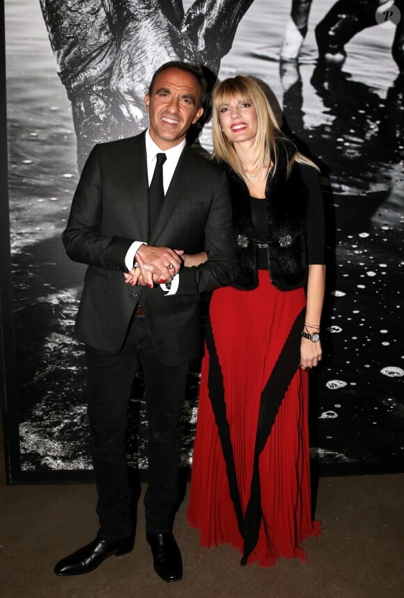 Nikos Aliagas et sa compagne Tina Grigoriou - Inauguration de l'exposition photographique de Nikos Aliagas intitulée "Corps et âmes" à la Conciergerie à Paris le 23 Mars 2016. © Dominique Jacovides / Bestimage