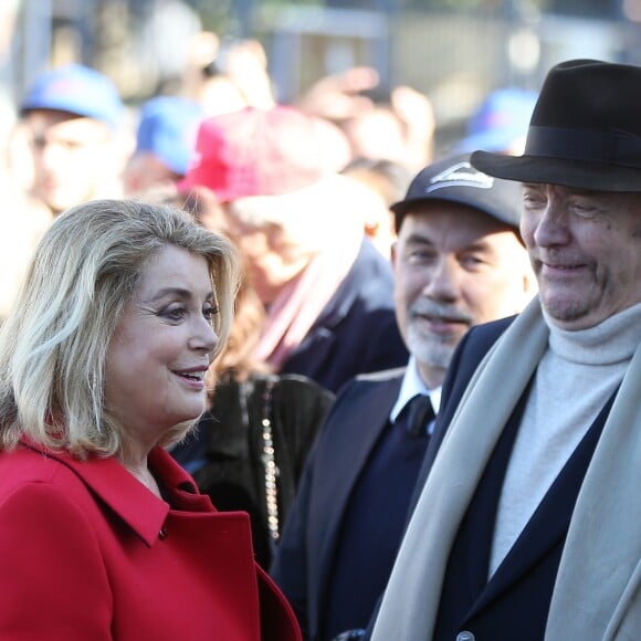 Catherine Deneuve et Jean-Paul Rappeneau lors du traditionnel remake du célèbre film de Louis Lumière de 1895 "La Sortie de l'usine Lumière à Lyon" à l'occasion du 8ème Festival Lumière à Lyon, le 15 octobre 2016