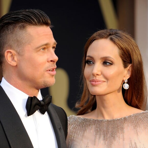 Brad Pitt et Angelina Jolie - Pressroom - 86e cérémonie des Oscars à Hollywood, le 2 mars 2014.