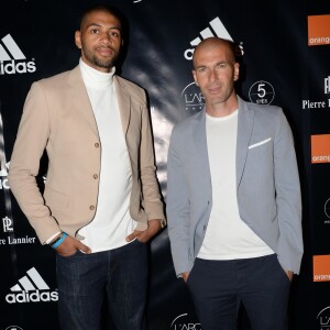 Nicolas Batum et Zinédine Zidane à la soirée Adidas à l'Arc à Paris, le 28 mai 2015.