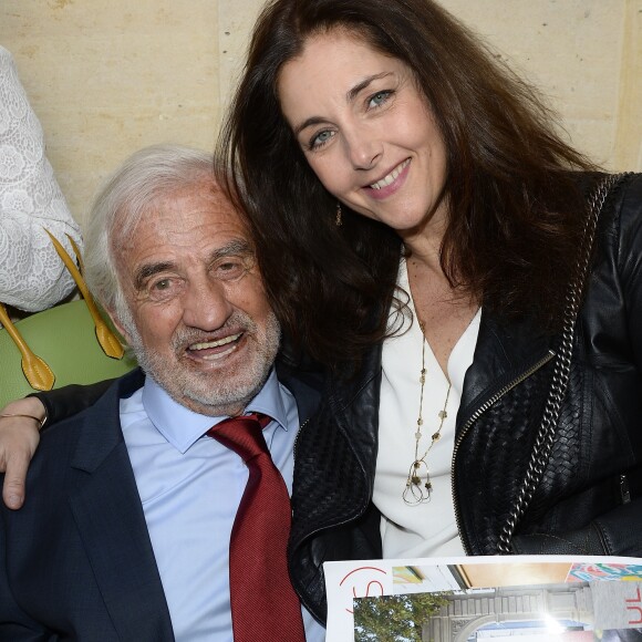 Jean-Paul Belmondo et Cristiana Reali - Soirée du cinquième anniversaire du musée Paul Belmondo à Boulogne-Billancourt le 13 avril 2015.